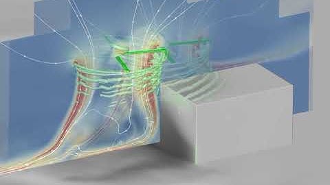 Aerodynamic investigation of a helicopter rotor hovering in the vicinity of a building