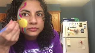 Emoji face paint cheek art