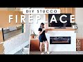 EASY DIY FAUX STUCCO FIREPLACE SURROUND BUILD | Wood Slat Wall Fireplace Makeover