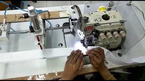 Auto marking, sewing & cutting of waist band elastic machine