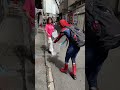 spiderman picking up trash