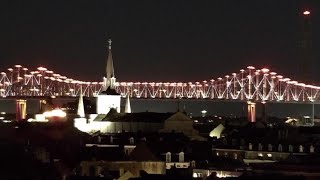 Why the Crescent City Connection glowed gold and white for one family Sunday night in New Orleans