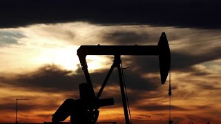 Wall Street drops as U.S. crude crashes below $0