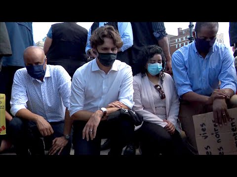 Prime Minister Justin Trudeau takes a knee at anti-racism protest in Ottawa