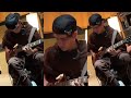 Corbyn besson on the guitar in the studio