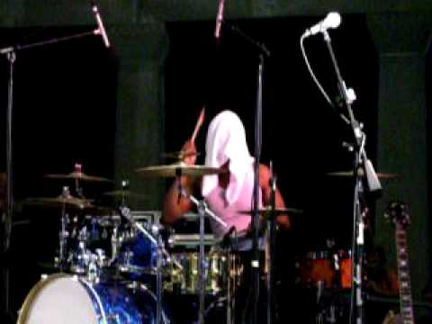 Drum Solo by Terrance Houston with a towel over hi...