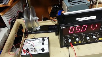 Inserting a dielectric in a capacitor