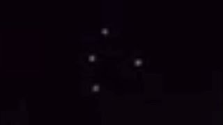Footage of 'Black Triangle' UFO shows mysterious lights drifting over city