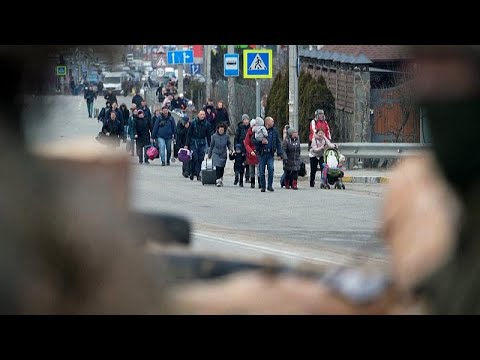 Ukrainians flee fighting north of Kyiv over bombed-out bridge