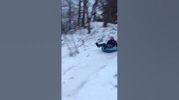 Epic Sledding Wipeout with a elderly man