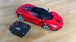 Laferrari - the fastest and most expensive ferrari so far... this is
my biggest "el cheapo" rc car far. it's in 1:18 scale. i bought it a
local toy sto...