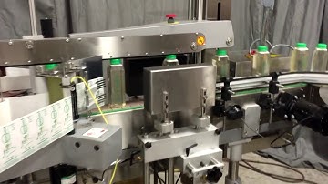 Front Back Labeler, Accumulating Rotary Table Model RA 3200, containers bottle 16oz