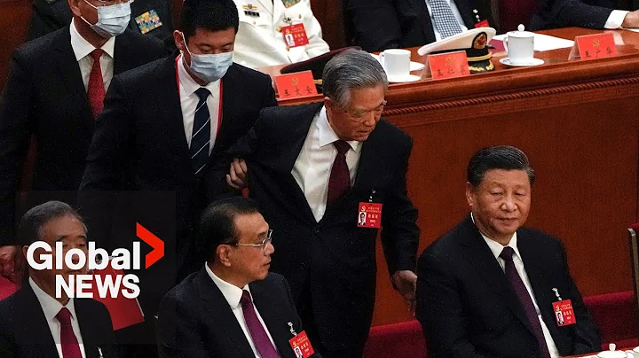Chinas ex-president unexpectedly escorted out of C...