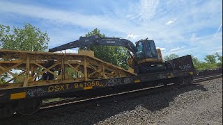 Train meet at Bolivar! A monster CSX manifest with DPU meets a short CSX manifest with a excavator!
