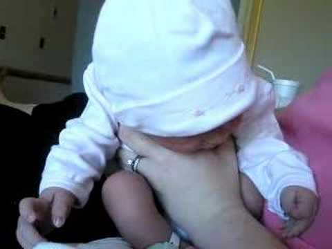 Lila making faces and first burp.