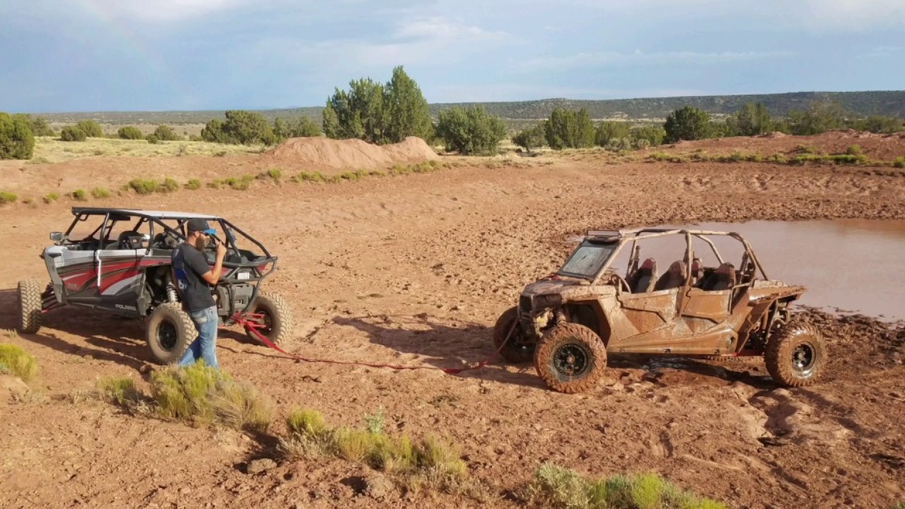 Getting the RZR 1000 stuck in the mud. - YouTube