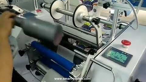 Small gear oil bottle round shape desktop label applicator tabletop labeling machine testing video