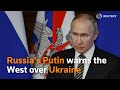 Russian President Vladimir Putin warns the West over Ukraine