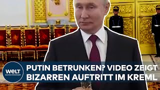 UKRAINE-KRIEG: Mit Sektglas in der Hand! Putin betrunken? Video zeigt bizarren Auftritt im Kreml