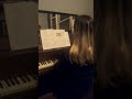 Whitney r playing piano