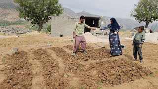 Planting a vegetable garden for Susan by the master worker