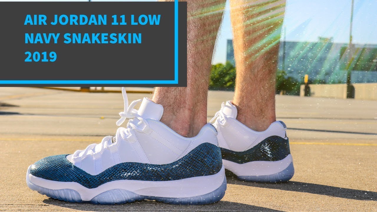 jordan 11 low blue snakeskin on feet