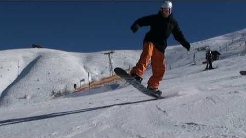 How to ollie on a snowboard - slow motion nollie