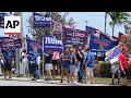 Trump supporters rally in Florida ahead of his arrival