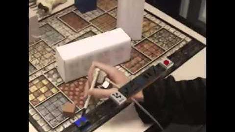 Collaborative Augmented Reality Environment: Virtual & Real Object Manipulation