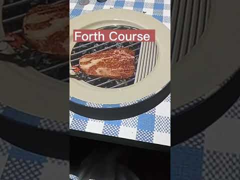 Tanyalee Davis le Petite comedian eating at Le Petite Chef Dining Experience