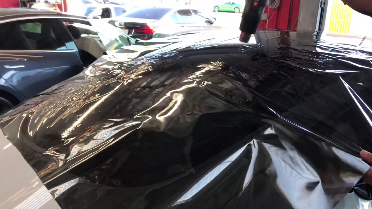 Image of Tesla Model 3 Performance back windshield shrinking and tinting in one