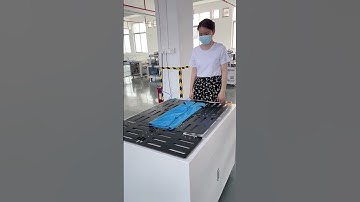 Máy gấp quần áo/Clothing folding machine