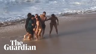 Australian pro surfer Mikey Wright saves woman struggling in Hawaii surf