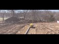 Rough driveway and swaleTLx