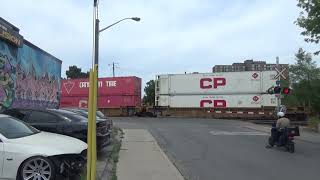 CPKC 113 intermodal stack train w./ KCS grey ghost at West Toronto junction.