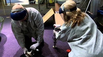 How many projectionists does it take to change an IMAX bulb?