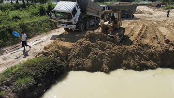 Top Best Machine on Land Filling Processing Mighty Bulldozer Dump Truck Spreading Dirt into Water