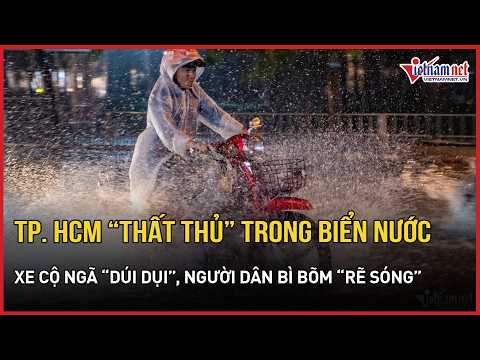 Ho Chi Minh City "under siege" in a sea of water: Vehicles stall out as residents trudge through ...