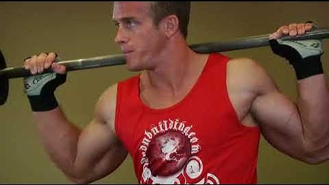 Abdominals   Seated Barbell Twist   Exercises Guide