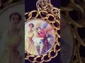 Handmade porcelain cameo (by another artist) and I set in pendant setting "Lady with her Birds"