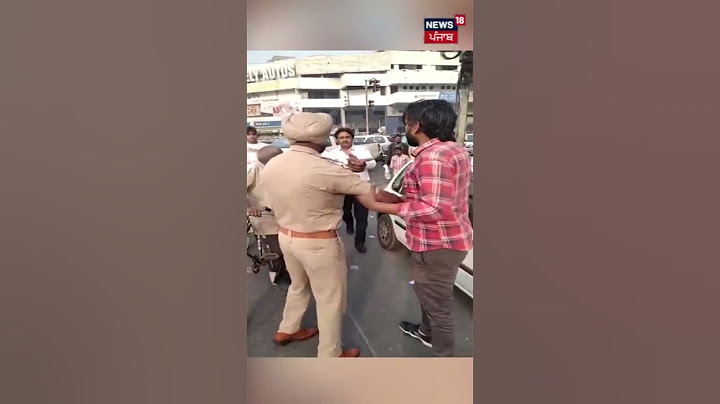 ਨੌਜਵਾਨ ਤੇ Police ਵਿਚਾਲੇ ਝੜਪ, ਜੜਿਆ ਥੱਪੜ ! | #shorts | Jalandhar | News18 Punjab