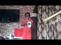 An 11 year old girl playing the trumpet 