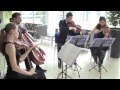 Classical music quartet plays at kpmgs bucharest office
