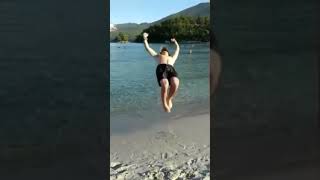 Guy backflips at the beach (Fail)