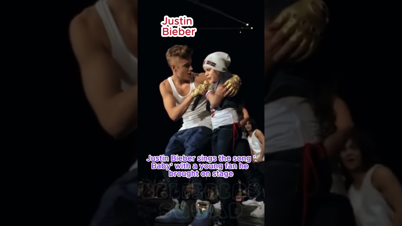 Justin Bieber sings the song 'Baby' with a young fan he brought on stage