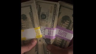 Counting $5,000 cash in 20’s (no talking)