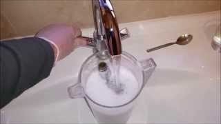 How to clean limescale in taps