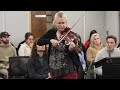 Rincon Valley music teacher plays in front of board ahead of layoff announcement
