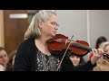 Rincon Valley music teacher plays in front of board ahead of layoff announcement