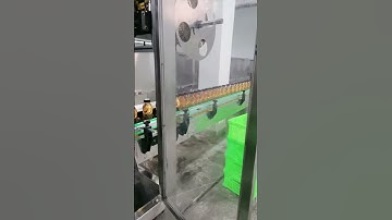Automatic sleeve labeling machine, commissioning production#drink #factory #automation #Labeling